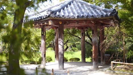a traditional gazebo in a garden setting