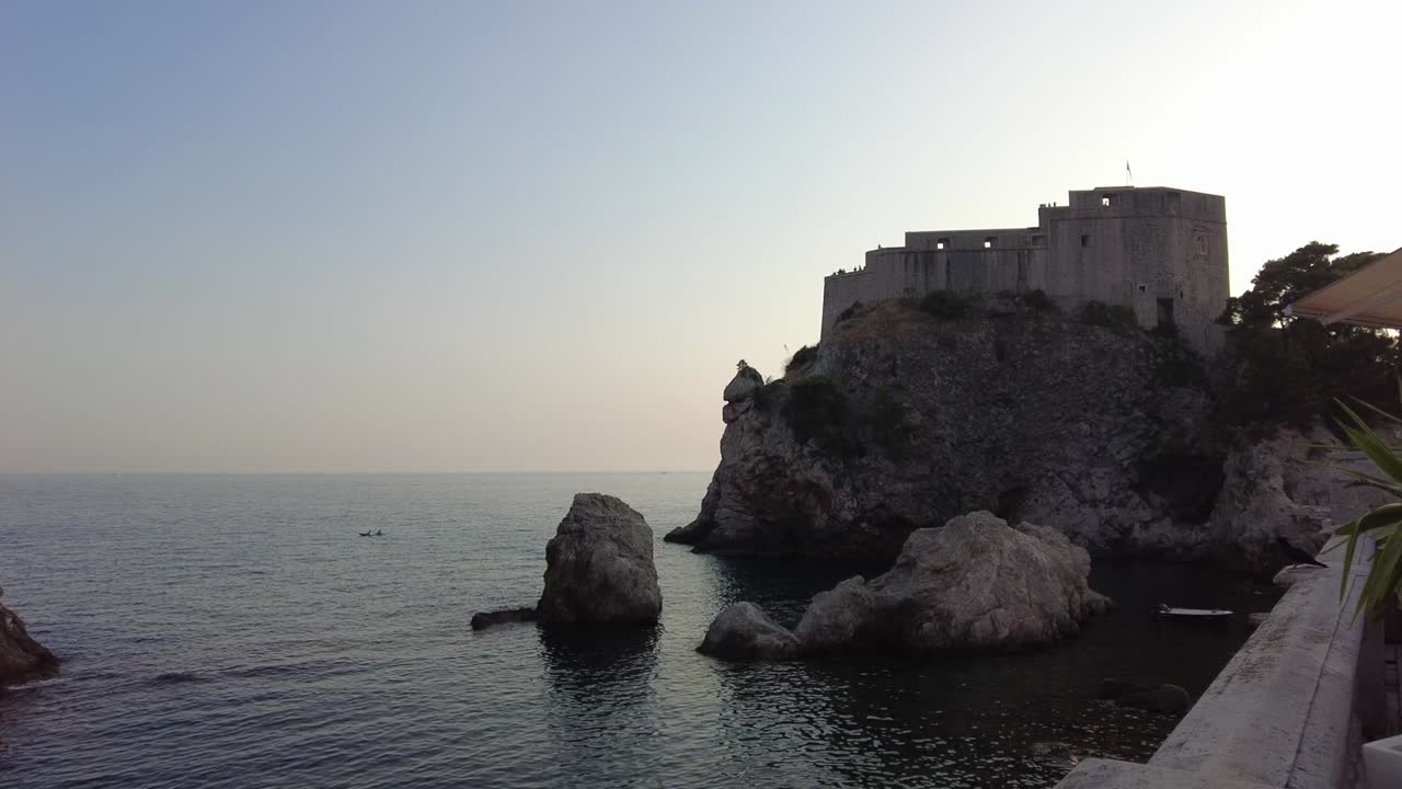 A glimpse of Fort Bokar in Dubrovnik, Croatia. This 15th-century coastal fortress is famous for its distinctive cylindrical design and historical significance.