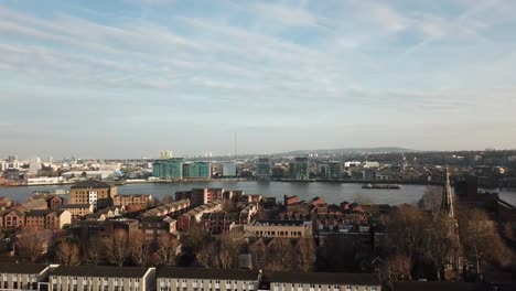 An-aerial-drone-view-of-Millwall-and-Island-Gardens-towards-Thames-river-of-London