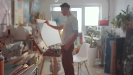 close up of painting brushes and tools in art studio