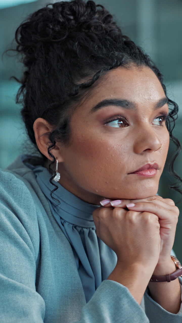 Portrait of a thoughtful business woman