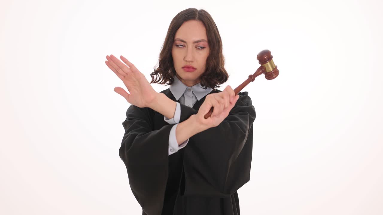 Female Judge Making Stop Gesture with Gavel