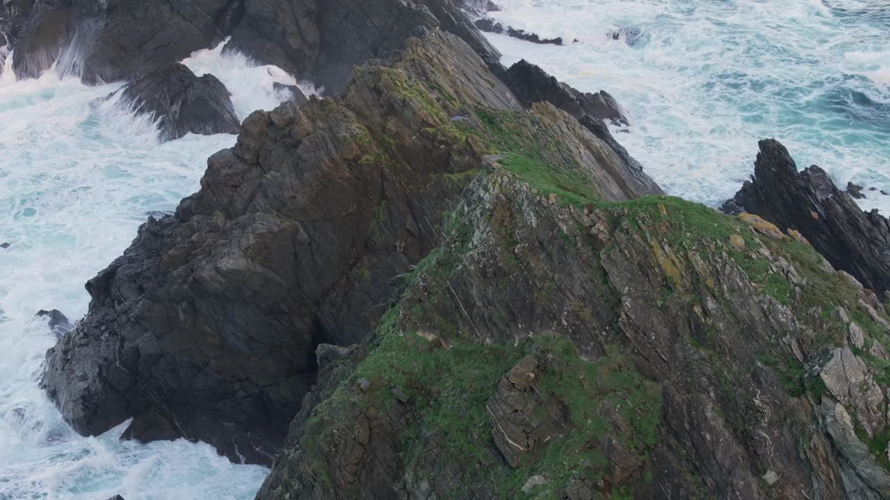 Waves Crashing On Rock Pillars On The Rocky Headland Of Punta Candieira (Candelaria) Near Cedeira, Galicia, Spain. Aerial Shot