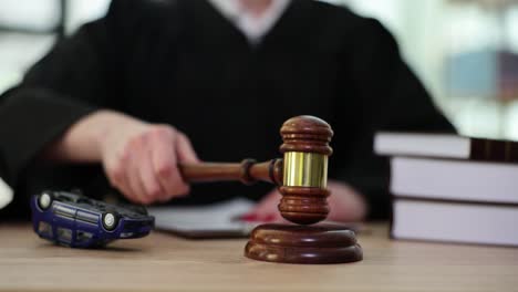 Courtroom scene with judge, gavel, and car accident concept