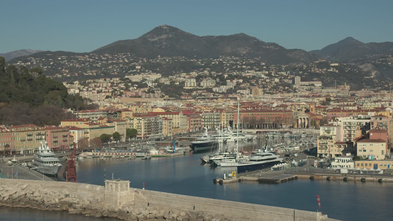 Aerial view of the Nice seaport during summer
lot of boats
Nice view with mountains in background