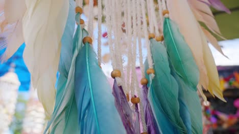 colorful dream catcher with feathers and beads