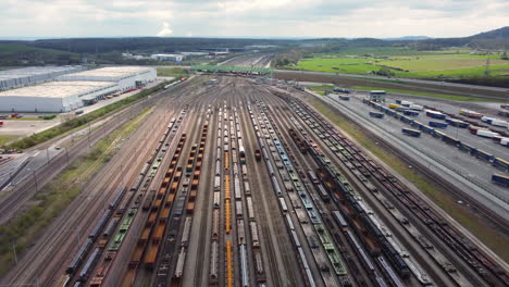 aerial view of a busy train yard and logistics hub