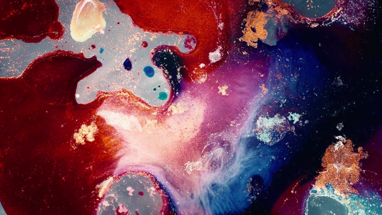 Top-down macro view of alcohol ink blending blue, pink, and gold pigments. Creative fluid art captured in high-contrast studio lighting for a dreamy atmosphere.