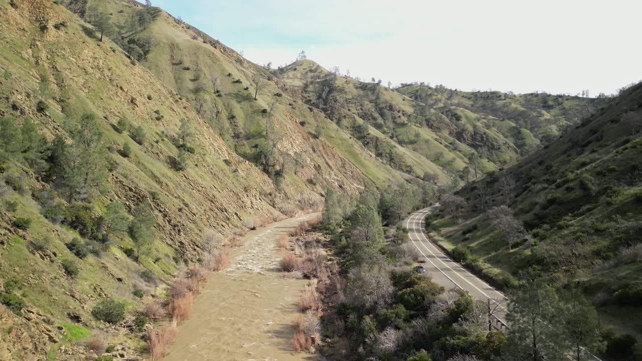 Cache Creek’s winding course is displayed from above, offering a unique view of its natural landscape.