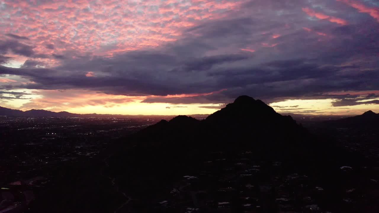 Silhouette of Camelback Mountain in Arizona's evening glow