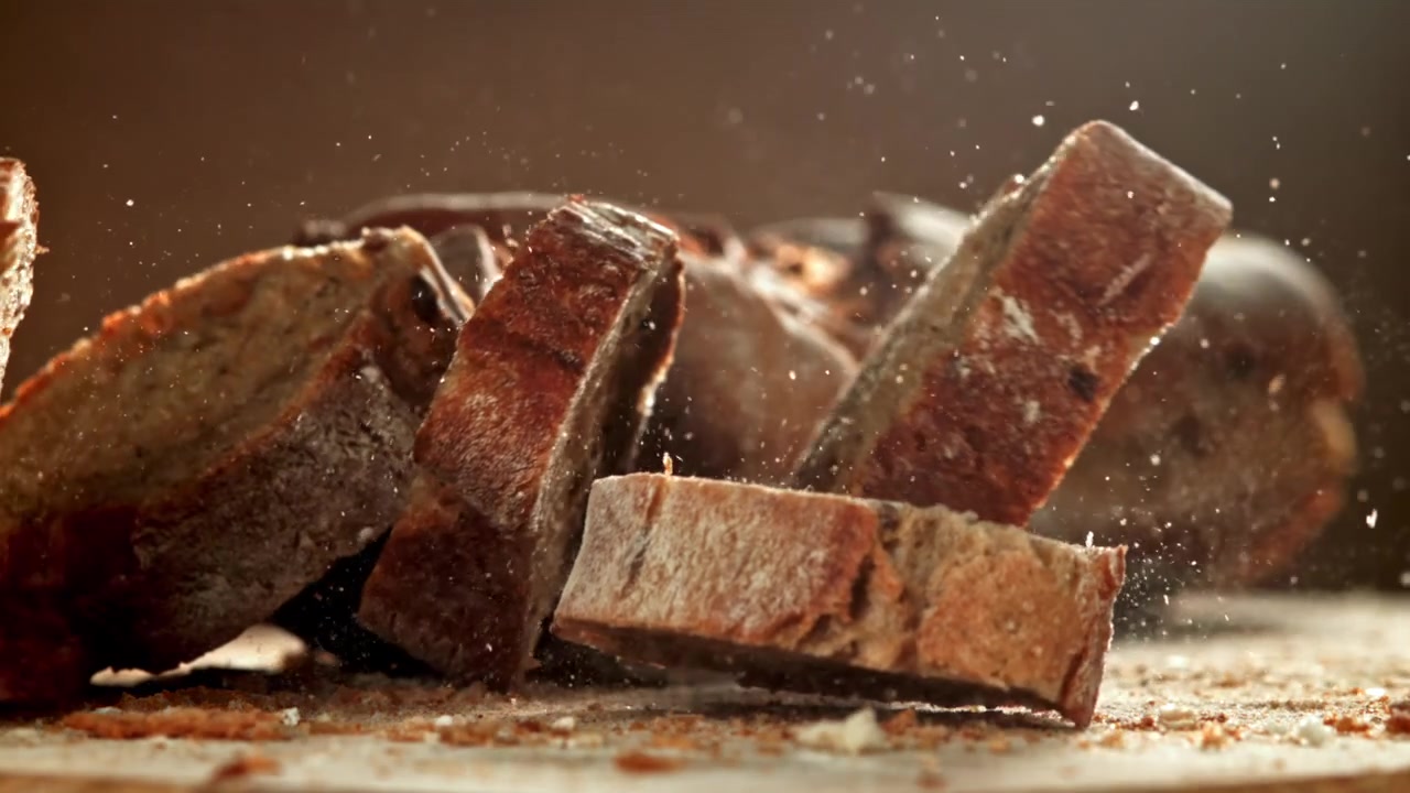 Fresh Rustic Bread Slices Falling in Slow Motion