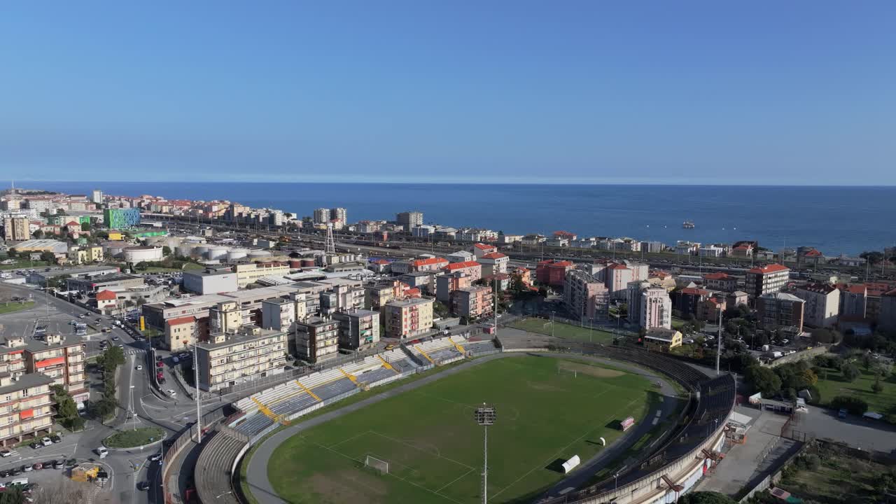 Savona Stadium with cityscape and coast view in the background