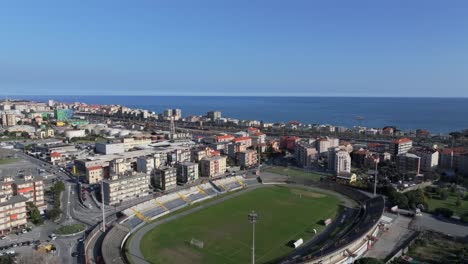 savona stadium with cityscape and coast view in the background
