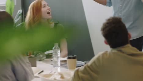 young-business-people-meeting-in-boardroom-celebrating-successful-corporate-victory-happy-multi-ethnic-group-enjoying-success-colleague-using-smartphone-taking-photo-sharing-on-social-media