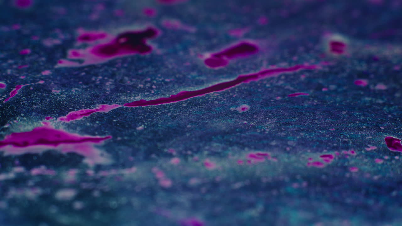 Colourful, organic, liquids macro shots buzzing and flowing