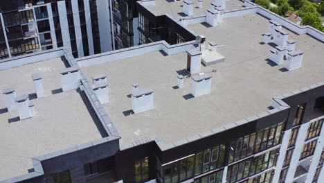 roofs of a modern multi-storey complex. high apartment buildings in new district in the city. top aerial view.