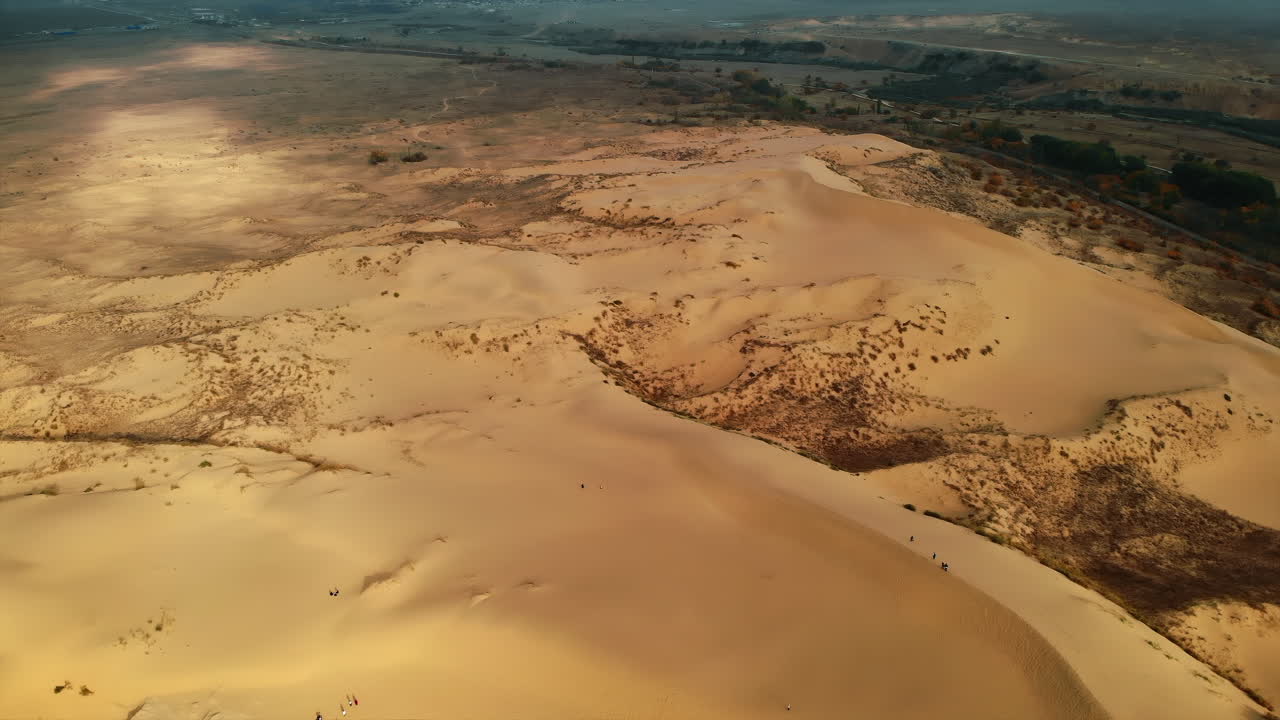 Aerial View of Sand Dunes in a Desert Landscape