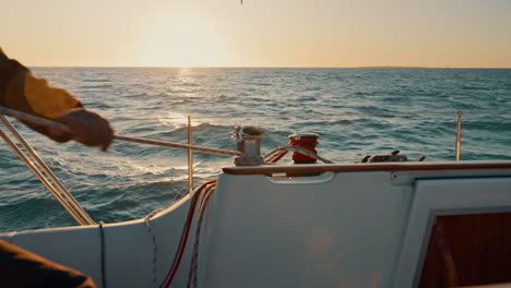 Sailor-hand,-boat-and-rope-of-yacht-for-sailing