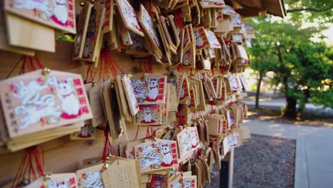 cat shrine "gotokuji temple" ema prayer boards, tokyo japan 4k