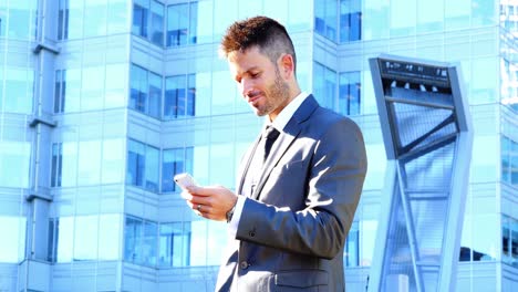 Businessman-using-mobile-phone