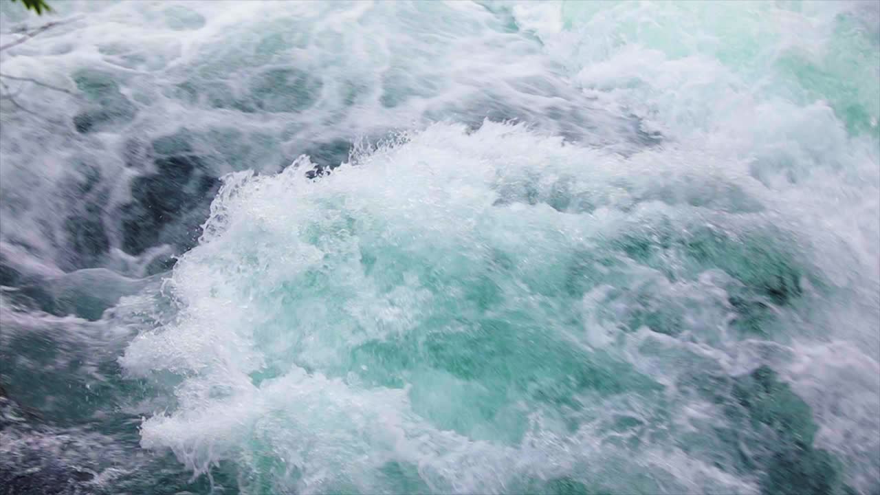 Mountain river water with slow motion closeup