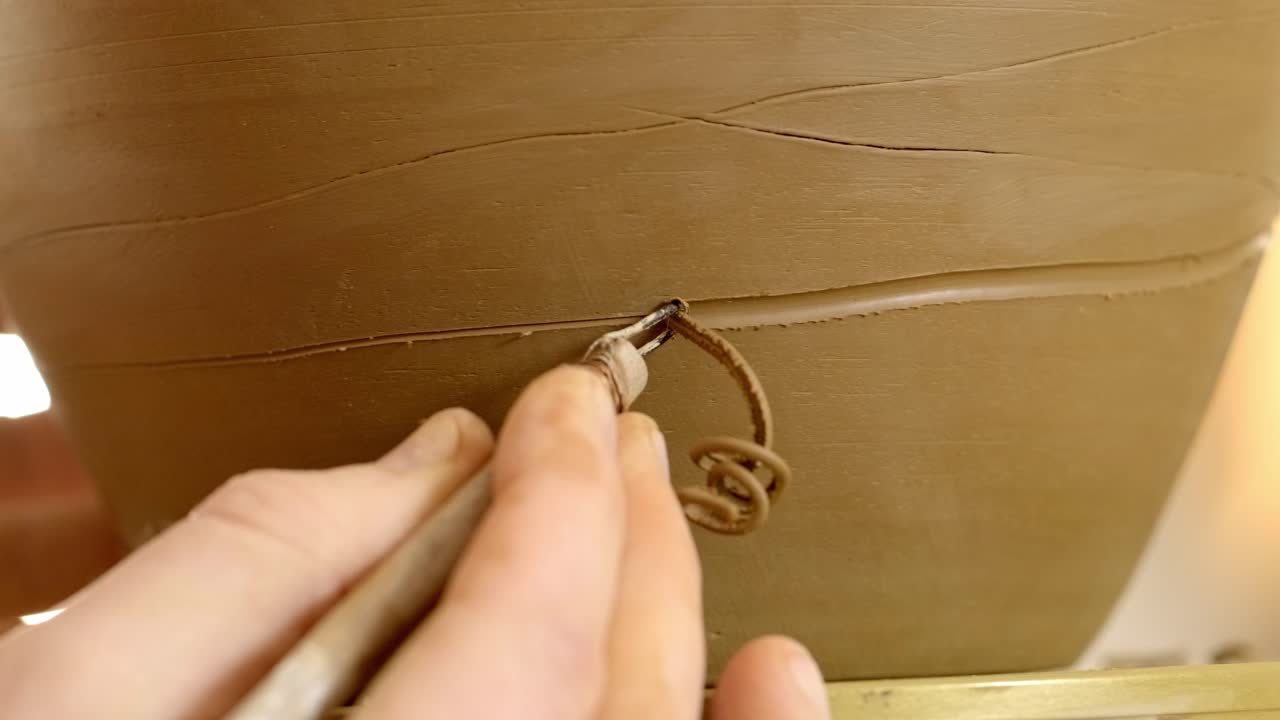 Pottery Artist Shaping Clay on Wheel