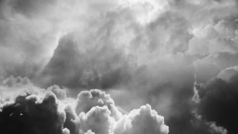 view of dark cumulonimbus clouds in the sky and a thunderstorm