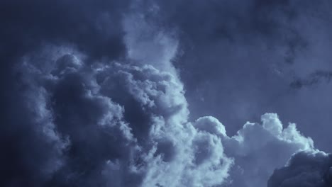 thunderstorms occur between thick and dark clouds that move