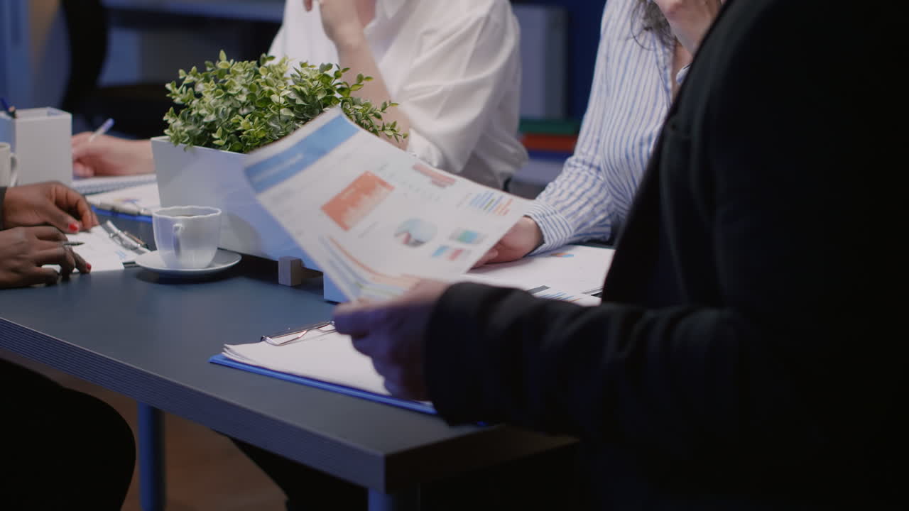 Corporate worker holding smartphone for video call