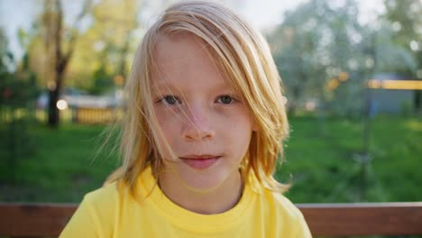 boy in a yellow shirt