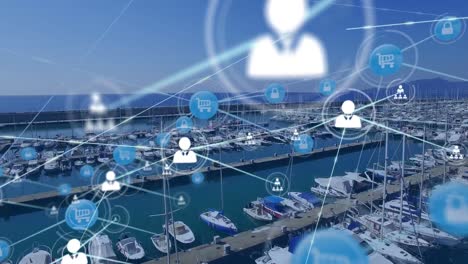 red de iconos digitales contra la vista aérea del puerto portuario