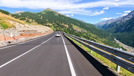 car driving through scenic mountain road