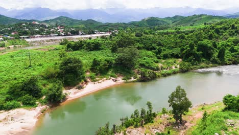 aerial view dolly of the river and the city in lam dong