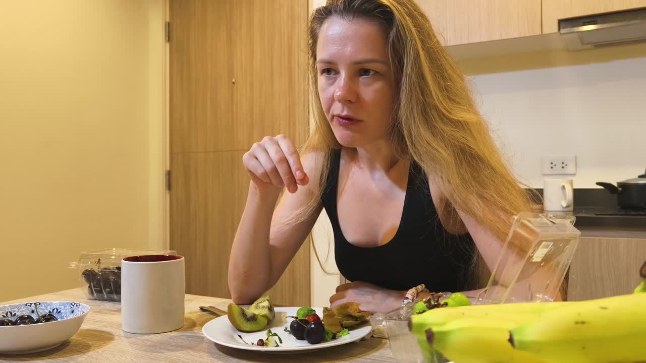Woman Eating Fruit