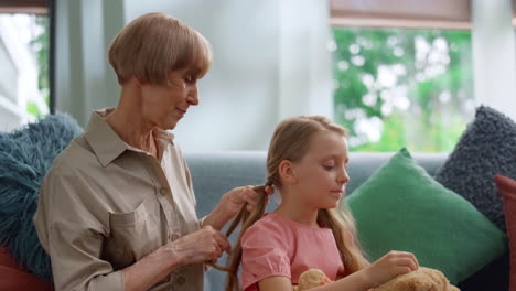 Happy-grandma-and-granddaughter-enjoying-time-together