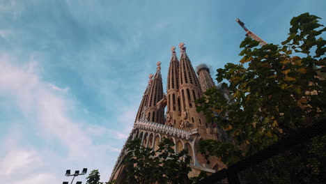 dramatic push-in establishing shot of la sagrada familia in spain