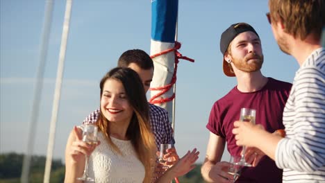 friends celebrating on a yacht