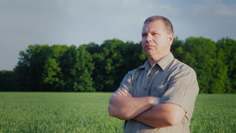 Confident-Middle-Aged-Farmer-Standing-In-The-Field-Master-Of-Business-Concept-4K-Video