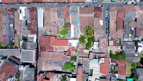 Aerial-drone-bird's-eye-view-of-street-rooftops-of-shops-and-housing-in-Galle-Fort-old-town-historic-square-Sri-Lanka-travel-holidays-tourism-South-Asia