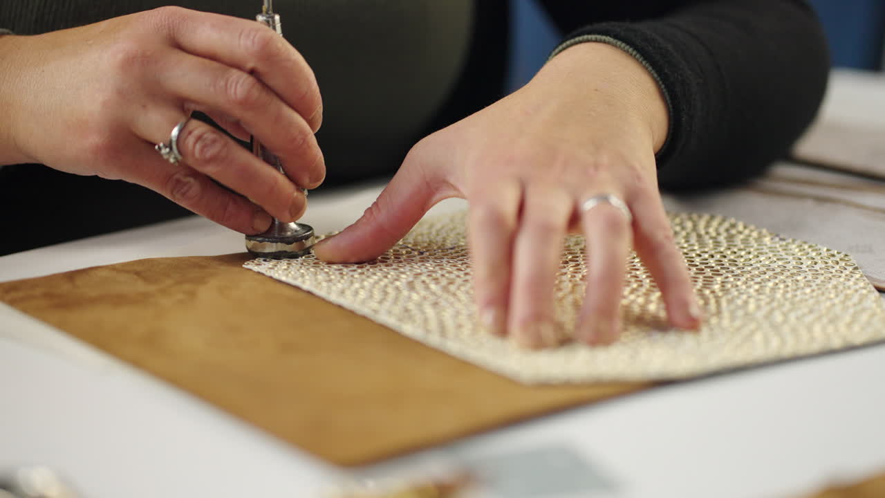 Crafting leather with a hand tool