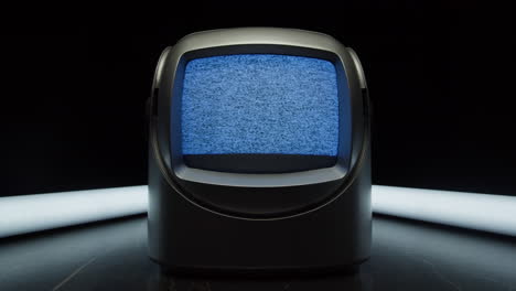 retro tv, vintage television in a nostalgic setup, a retro tv displays grain on screen, scary halloween night device good for chroma key and green screen. high quality 4k footage