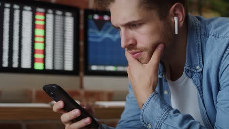 Busy-young-man-and-technology