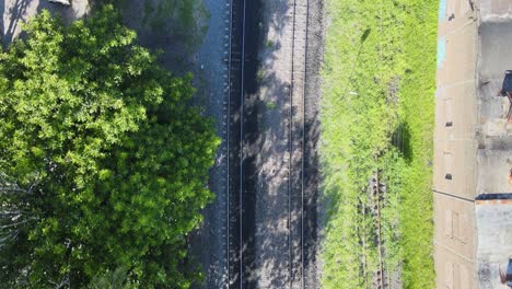 aerial view following the train tracks