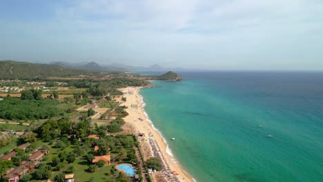 Aerial-views-with-drone-in-Sardinia-Italy-beach-with-green-vegetation-white-sand-and-turquoise-water-Villasimius