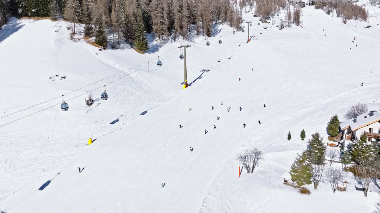 Aerial drone view of the Colfosco ski resort in South Tyrol, Dolomites, Northern Italy