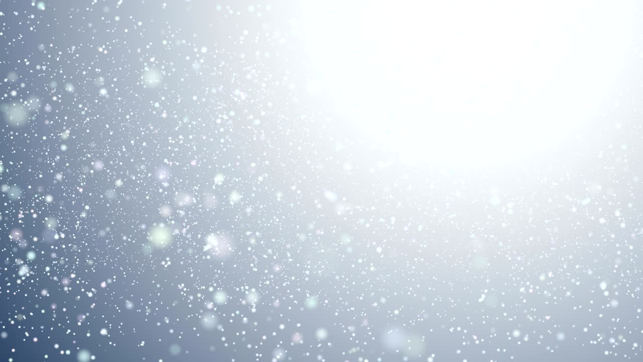 Defocused white snow particles