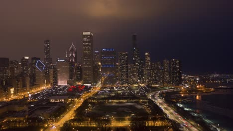 urban cityscape of chicago at night in winter. aerial view. usa