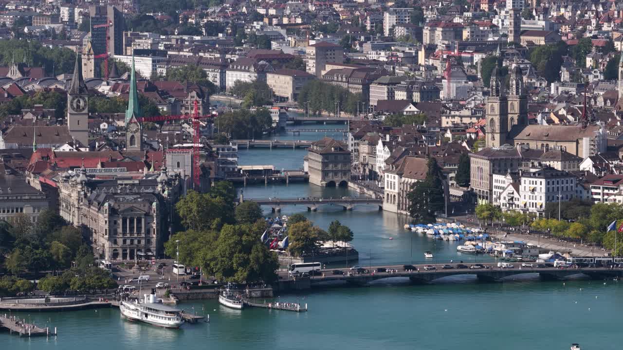 Aerial drone video of Zurich city views, Zurich Lake, cathedrals, skyline, and Limmat River