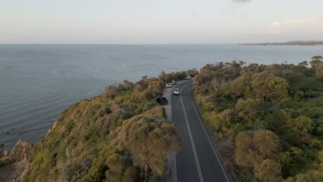 coastline cliff beach road at sunset