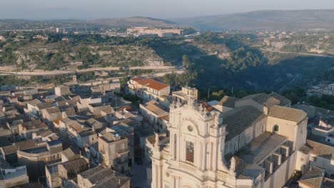 Aerial-view-of-Modica-Alta-Val-di-Noto-Sicily-Old-Baroque-Town-Church-South-Italy-at-Sunrise